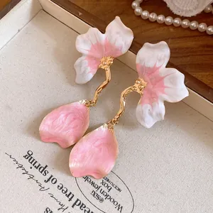Enamel flower drop earrings in pink and white with golden stem details