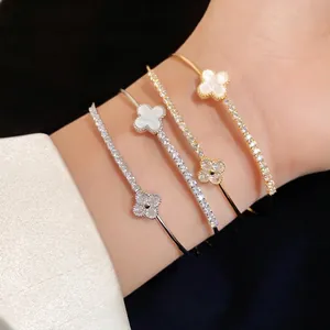 Elegant four-leaf clover zircon open bangles in gold and silver plating