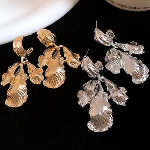Elegant vintage textured leaf drop earrings in gold and silver finish for women