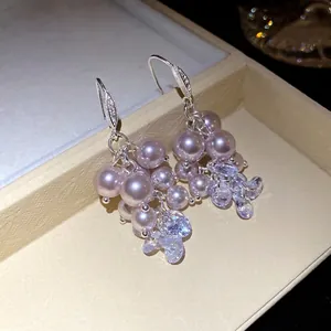 Elegant French vintage style drop earrings featuring pink pearls and cubic zirconia tassels