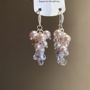 Exquisite French retro drop earrings featuring pink imitation pearls and sparkling zircon clusters