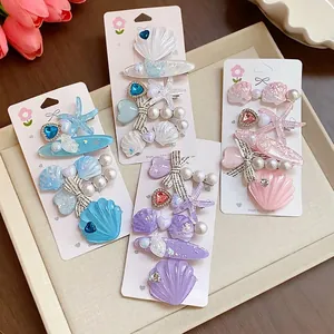 Elegant resin starfish and seashell hair clips with pearls and rhinestones in four colors