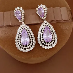 Elegant luxury teardrop hollow earrings with purple zircon and silver needle setting