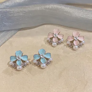 Exquisite flower stud earrings with pastel enamel petals, pearls and cubic zirconia