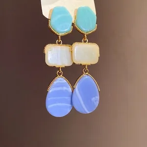Vintage style resin drop earrings with geometric shapes in teal, white and blue