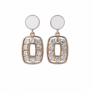 Elegant vintage rose gold drop earrings with white studs and rhinestone rectangle