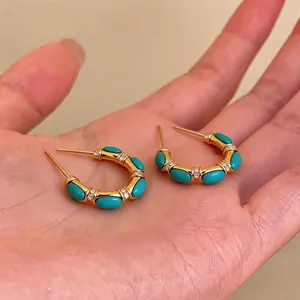 Retro 18k gold plated C-shaped hoop earrings featuring turquoise stones and zircon accents