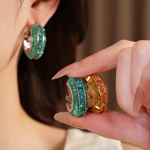 Elegant crystal-encrusted geometric hoop earrings with silver needles, luxury jewelry for women.