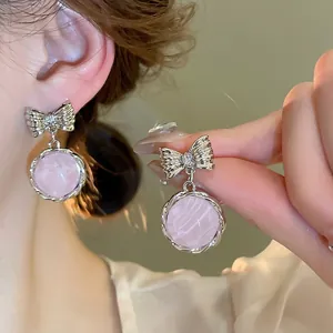 Sweet Korean style silver bow earrings with round pink stone charms for women