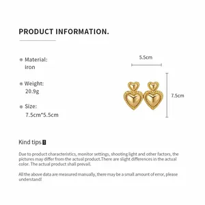 Detailed info of vintage gold heart earrings showing material, weight, and dimensions.