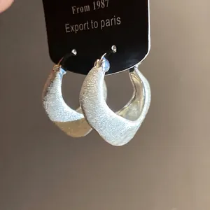 Brushed 18K gold plated vintage round hoop earrings for elegant styling