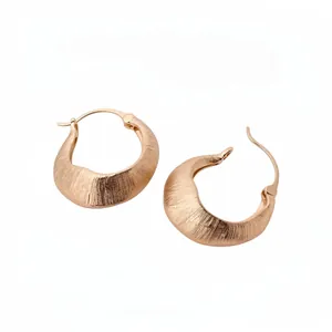 Vintage style 18K gold plated hoop earrings featuring a sophisticated brushed finish
