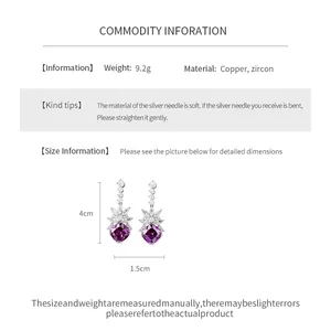 Detailed dimensions of silver needle earrings with purple zircon crystals and 9.2g weight