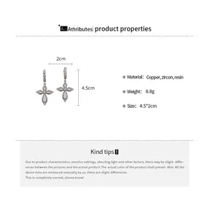 Technical infographic showing 4.5cm dimensions and copper material of zircon cross earrings