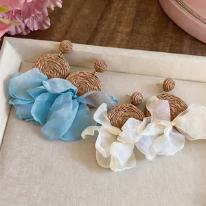 Bohemian style raffia woven stud earrings with blue and white chiffon ruffles for women