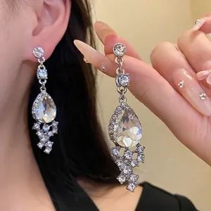 Elegant silver teardrop drop earrings with sparkling rhinestones for women
