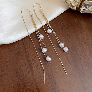 Minimalist elegant 18k gold plated long tassel earrings with small white pearls