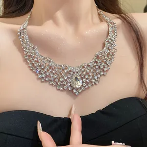Close-up of elegant hollow rhinestone necklace with pear-shaped waterdrop pendant