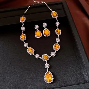 Elegant orange teardrop rhinestone necklace and earrings set for women in luxury style