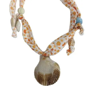 Ocean theme silk scarf necklace with starfish print and large natural shell pendant