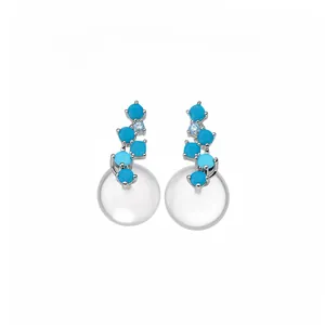 Elegant silver drop earrings featuring blue round stones and white resin sphere charms