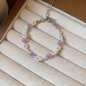 Bracelet à fleurs en perles de verre fait main avec fermoir mousqueton réglable
