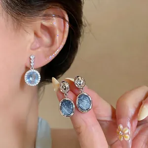 Eleganti orecchini pendenti blu cielo stellato stile francese con design irregolare