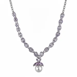 Elegant necklace with purple marquise-cut zircons and a white pearl pendant.