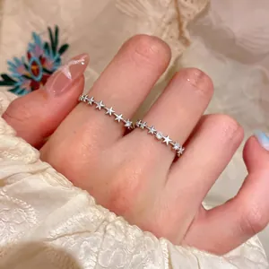 Elegant sterling silver open rings featuring a dainty sequence of zircon-studded stars for women.
