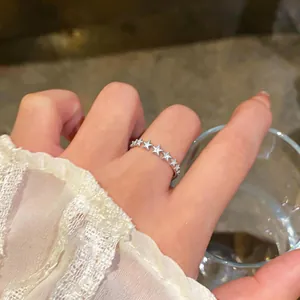 Elegant Korean style silver star open ring featuring shimmering white zircons for women