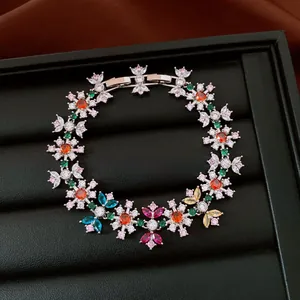Detailed macro shot of a vintage flower bracelet with vibrant multi-colored zirconia stones