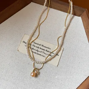 Κομψό επιχρυσωμένο κολιέ με μαργαριτάρια 18k και ζιργκόν σε γαλλικό vintage στυλ για γυναίκες