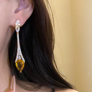 Boucles d'oreilles pendantes en argent plaqué or 18 carats avec zircon jaune poire
