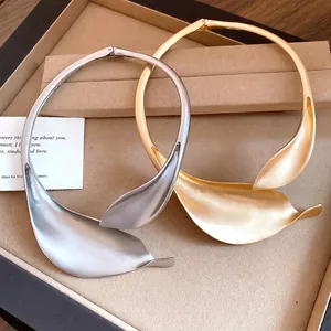 Elegant matte gold and silver leaf-style torque necklace set for women's jewelry