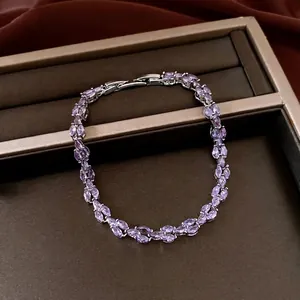 High-end purple marquise-cut zircon bracelet presented on a bronze jewelry display box