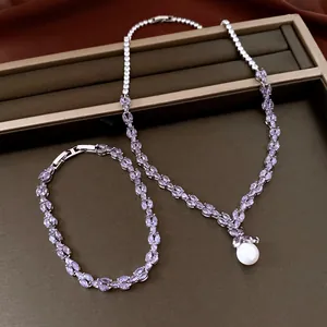 Elegant jewelry set with marquise purple zircon necklace and bracelet with pearl pendant