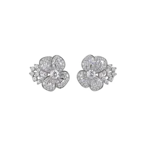 Luxury flower stud earrings with sparkling cubic zirconia in silver-tone finish