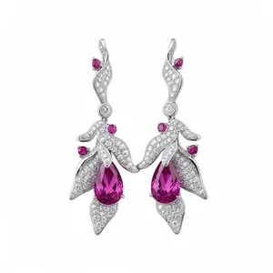 Elegant leaf drop earrings featuring pink teardrop zircon with silver needles