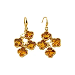 Elegant French vintage gold earrings featuring amber zircon clover flowers in tassel design