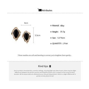 Detail view of irregular vintage court style enamel earrings with size and material specs