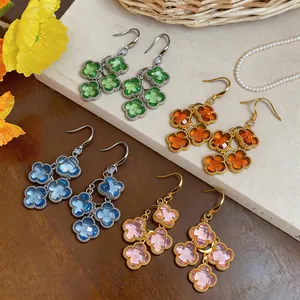 Four pairs of French retro zircon flower clover earrings in green blue pink and amber.