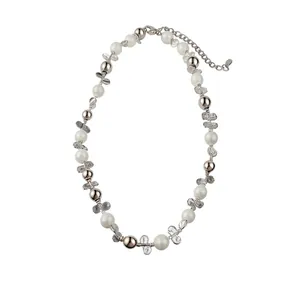 Elegant French style necklace with white frosted pearls and silver butterfly beads.