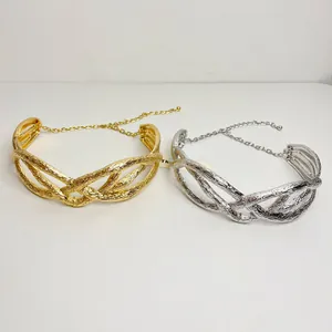Elegant metallic pleated twisted choker necklaces available in gold and silver finishes