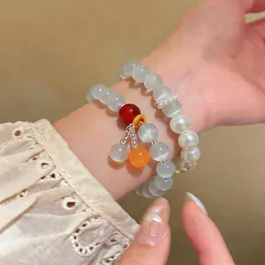 Set di braccialetti eleganti in perle occhio di gatto con maniche in pizzo vintage