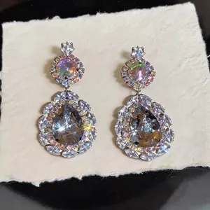 Luxury vintage court style waterdrop earrings with sparkling rhinestones and silver pins.