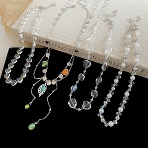 Selection of four French style beaded necklaces with pearls and crystal beads