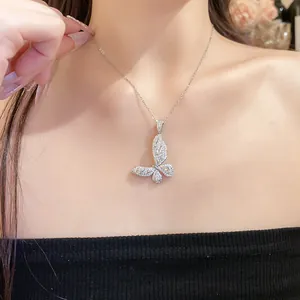 Sparkling zircon butterfly pendant necklace on a silver-toned clavicle chain for women