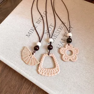Ethnic resin geometric pendant necklaces with wood beads and wax cords