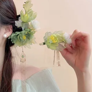 Elegant green lily of the valley flower hair clip with golden tassels for Hanfu