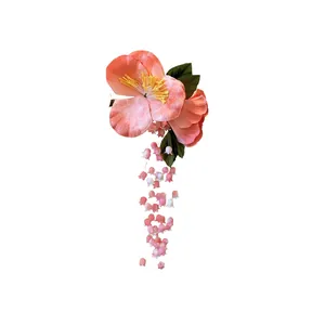 Elegant pink fabric flower hair clip with long bell-shaped floral tassels for women